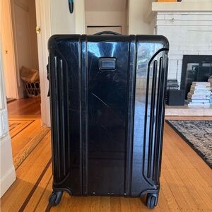 Tumi Tegra-Lite Worldwide Expandable 4 wheel suitcase.